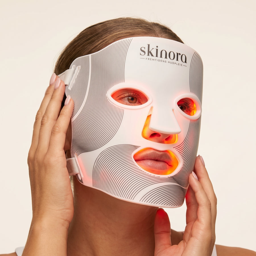 Skinora Radiance Face nært bilde av led-maske med rødt lys på LED light therapy device